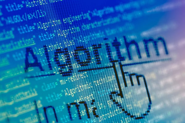 The word algorithm superimposed over the source code of a website about artificial intelligence