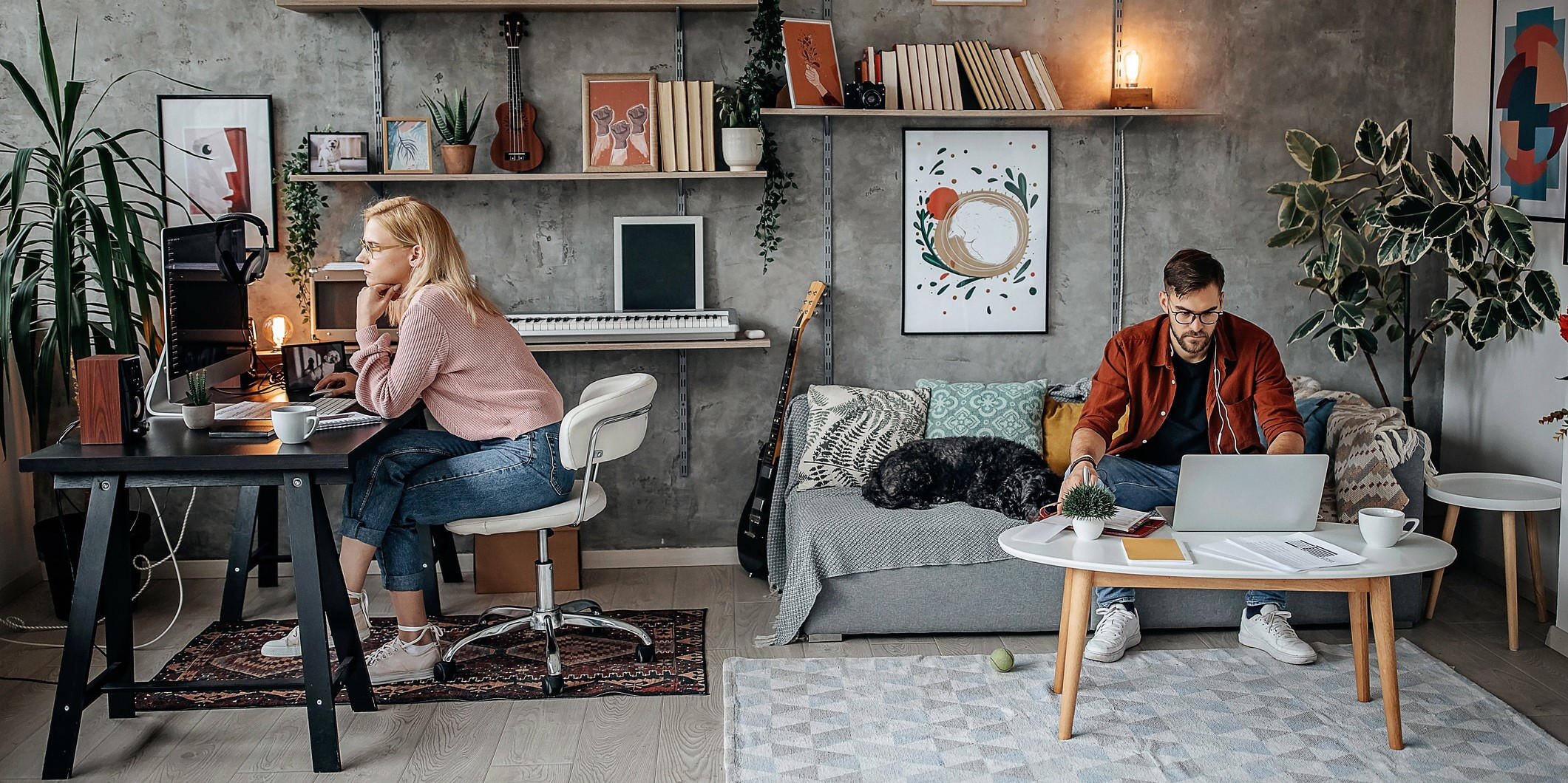 Young couple working from their home office