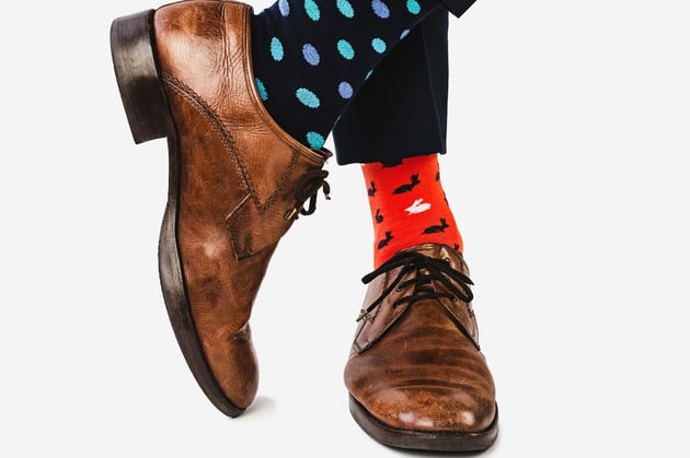 Brown shoes with different socks