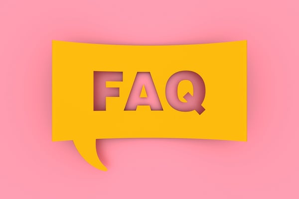 The letters FAQ in a yellow speech bubble on a pink background